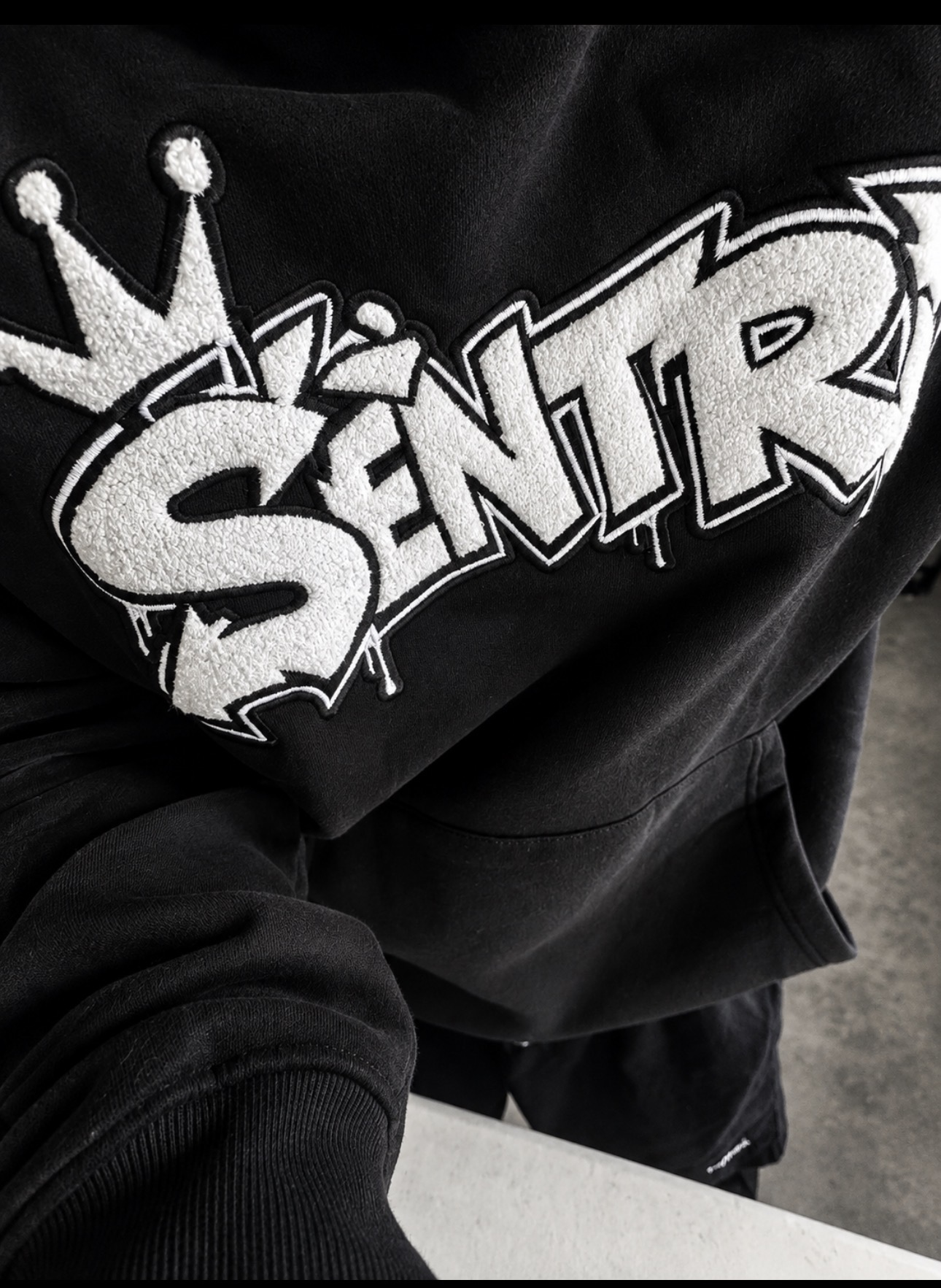 SÈNTRI graffiti logo with crown chenille embroidery detail