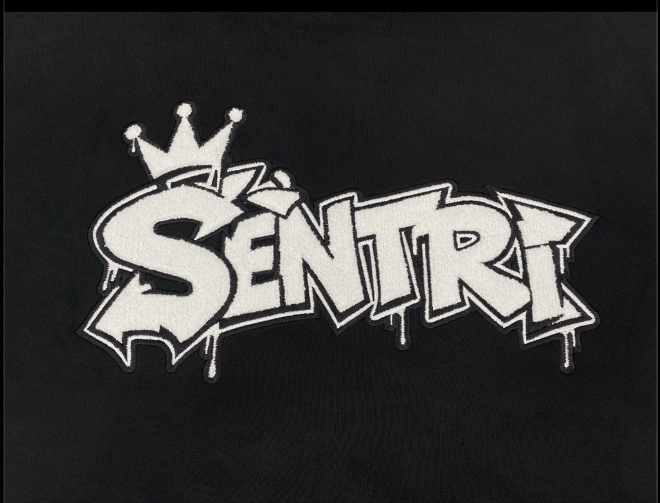 Detail of the SÈNTRI chenille graffiti logo embroidery
